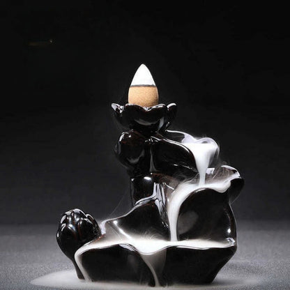 Ceramic backflow incense burner with smoke falling like a waterfall